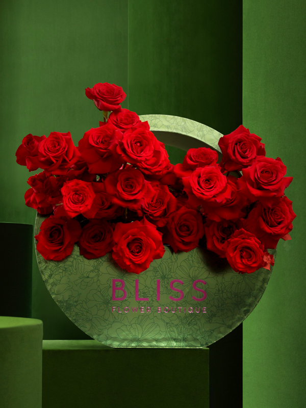 Shop Red roses in Bliss Bubble Bag